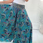 Lightweight trousers with ethnic print, elastic waist