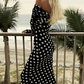 Elegant dress with polka dot pattern and bare shoulders