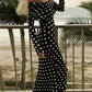 Elegant dress with polka dot pattern and bare shoulders