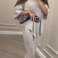 🥰Women's Casual Loose Fit Top & Skirt Two-Piece Set🔥